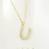 Caroline Svedbom - Letter Necklace U - Gold Crystal