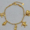 Mixed Brands - Bracelet turtle seahorse charms JBR327 - Gold